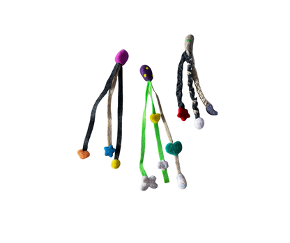 Colorful cat toy with multiple strands and attachments on a white background